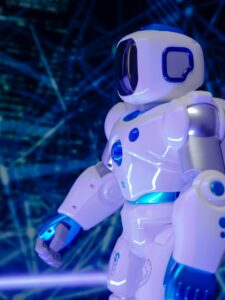 Close-up of a modern humanoid robot with glowing blue lights and futuristic design.